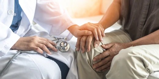 Doctor consulting a Parkinson’s patient at Nexus Clinic in Kuala Lumpur, discussing stem cell therapy options.